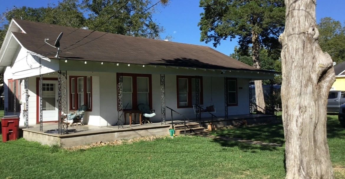 Exterior paint and porch posts — before — Skystone Homes LLC project