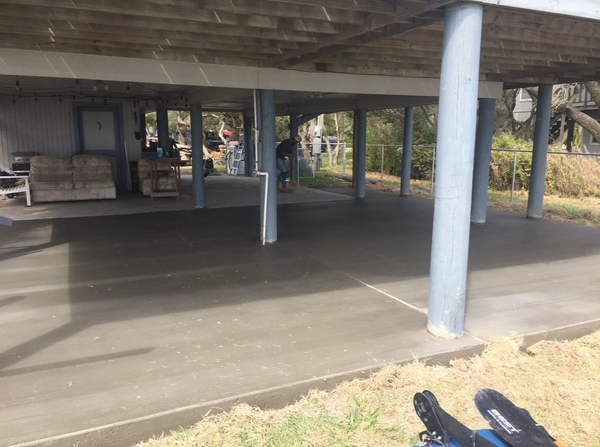 Finished concrete and support posts — Skystone Homes LLC project