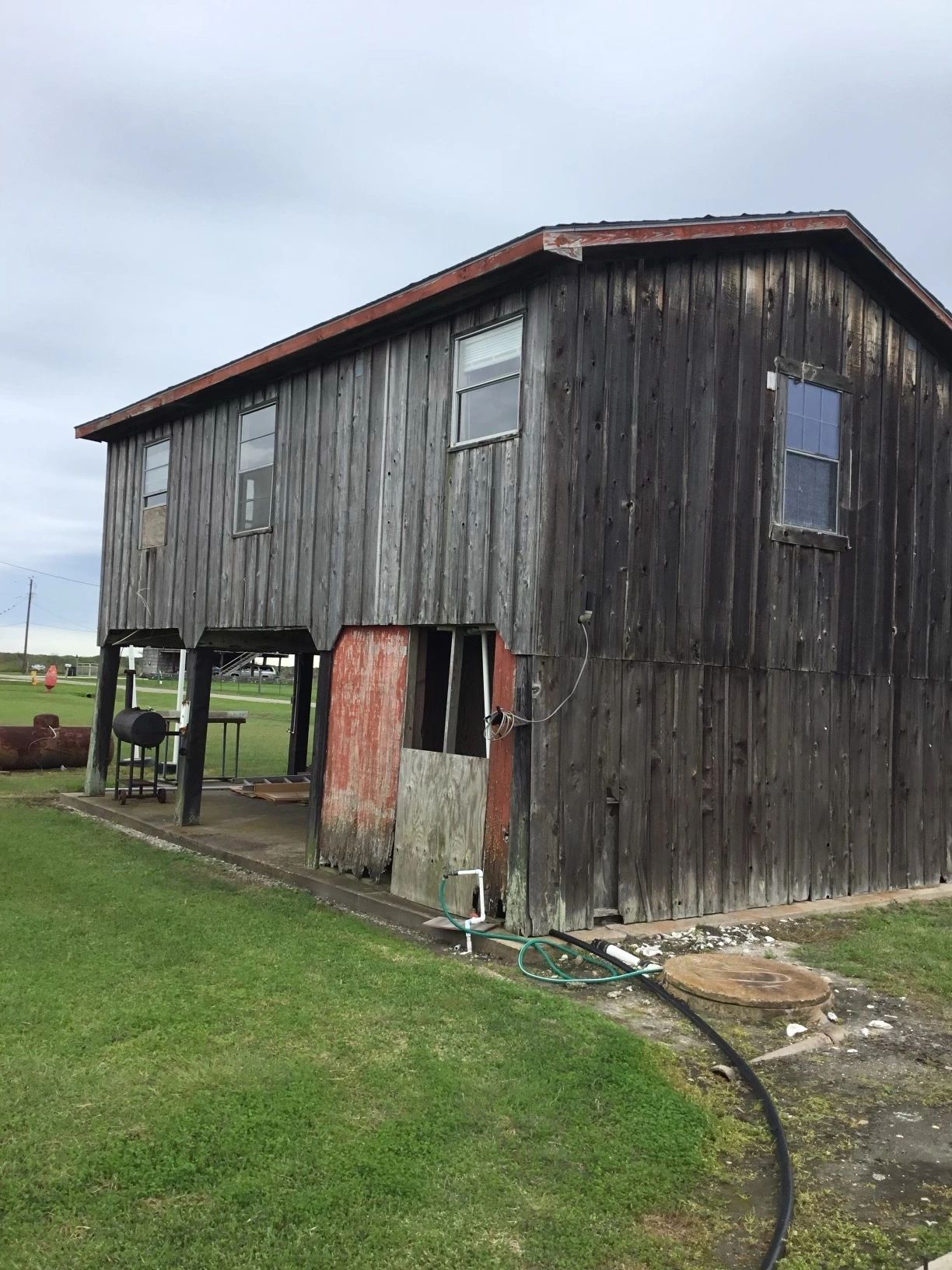 Re-roof and pilings project — before — Skystone Homes LLC project