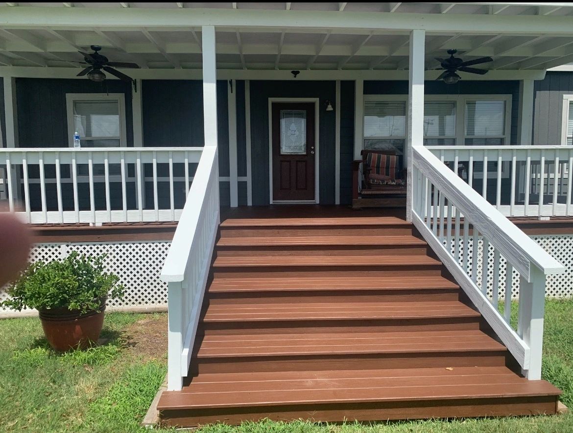 Painted front stairs and white railing — Skystone Homes LLC project