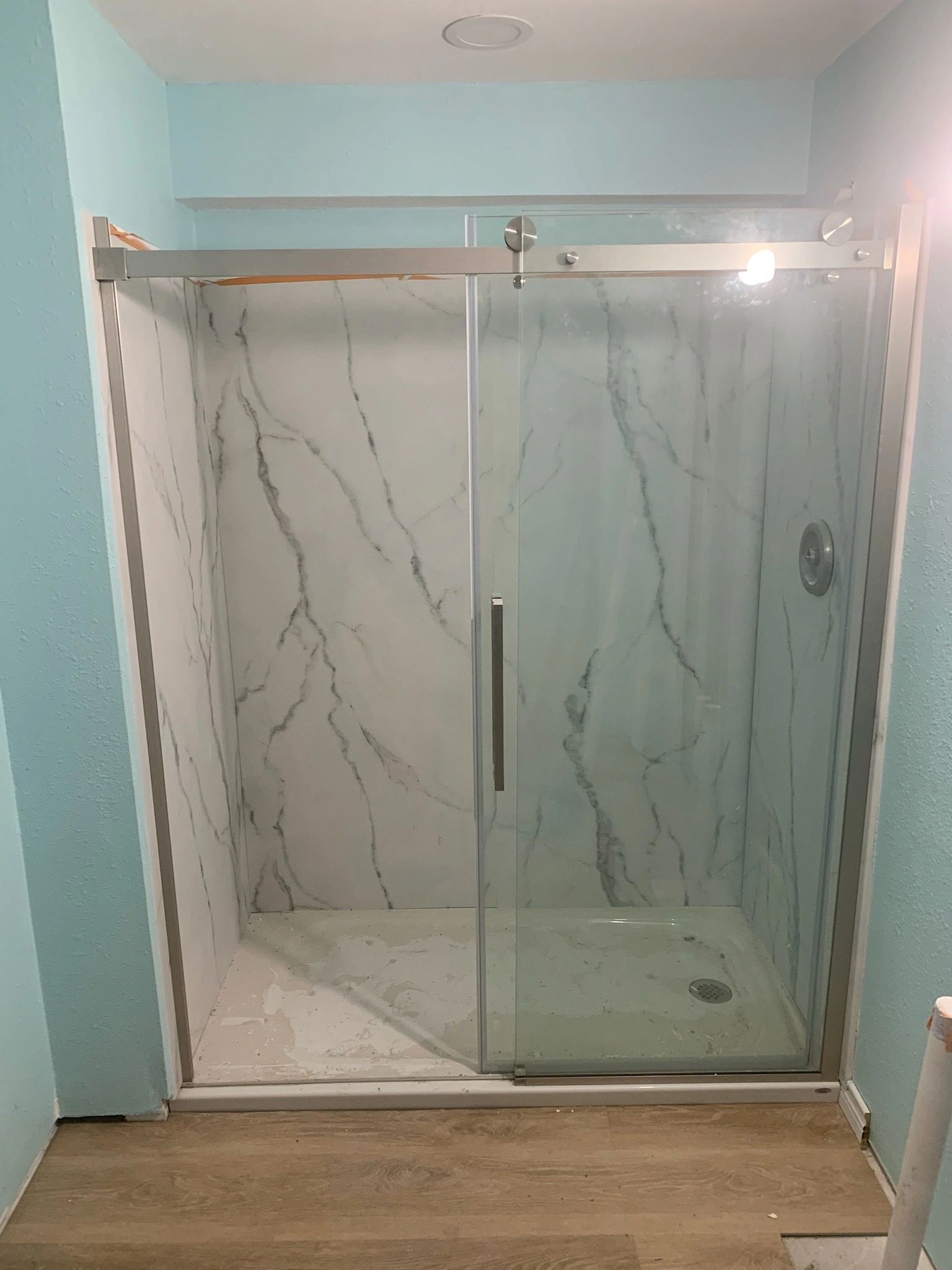 Remodeled bathroom — tiled shower — Skystone Homes LLC project