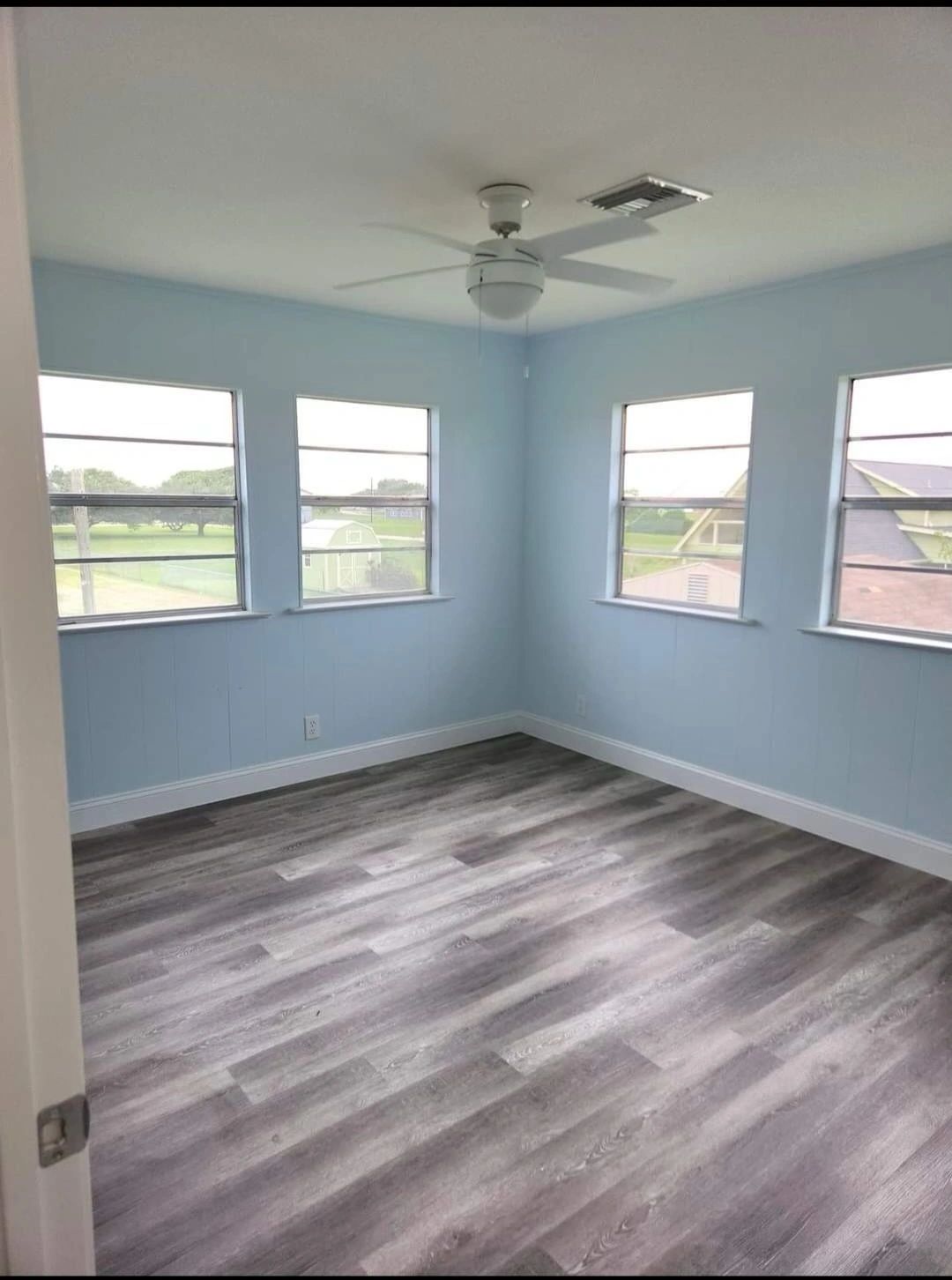 Living room remodel — new flooring — Skystone Homes LLC project