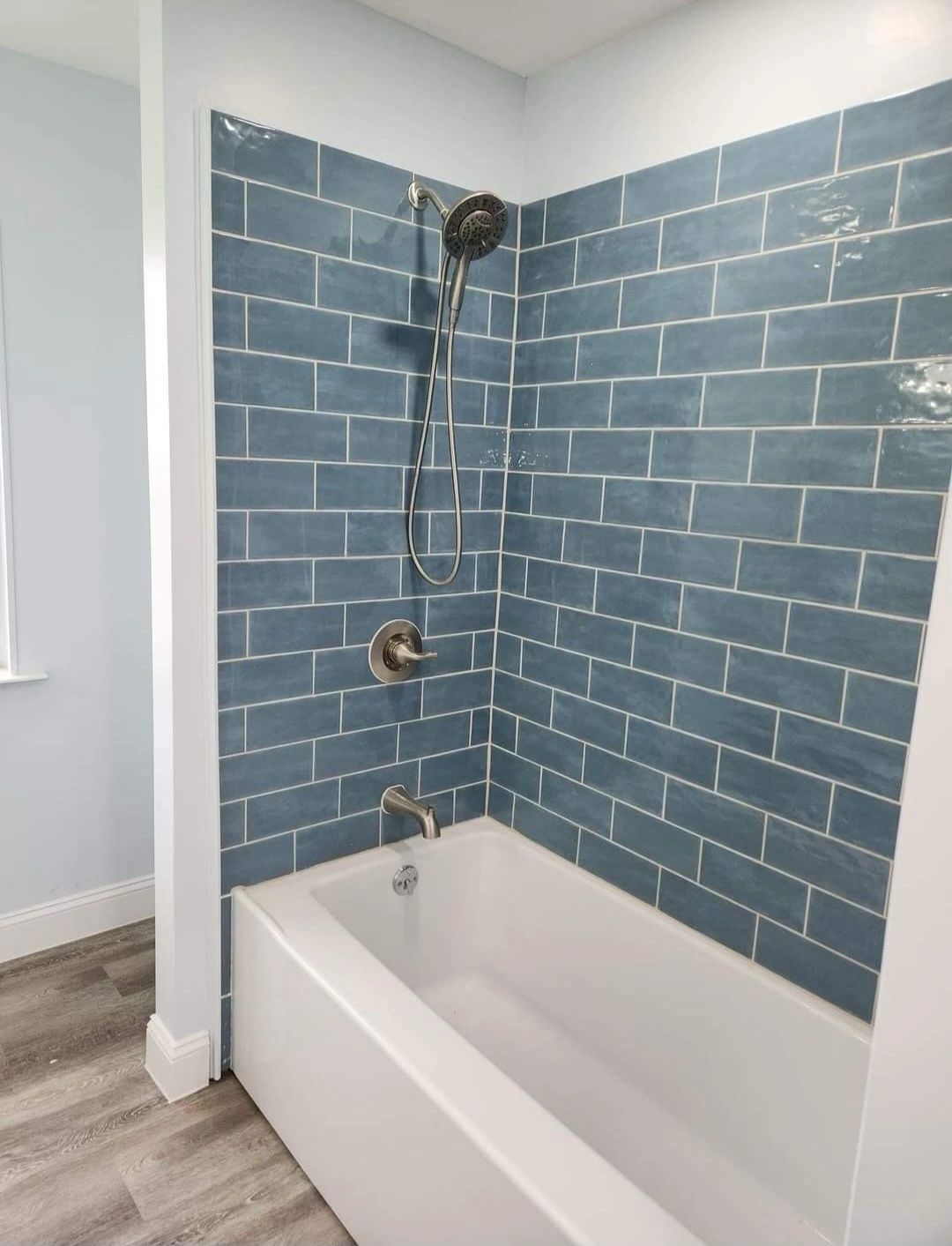 Remodeled bath with tiled surround — Skystone Homes LLC project